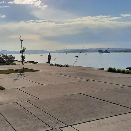Del Puerto *